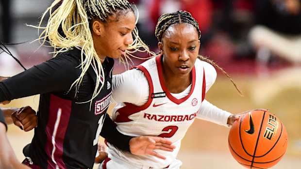 Razorbacks Samara Spencer drives against Mississippi State